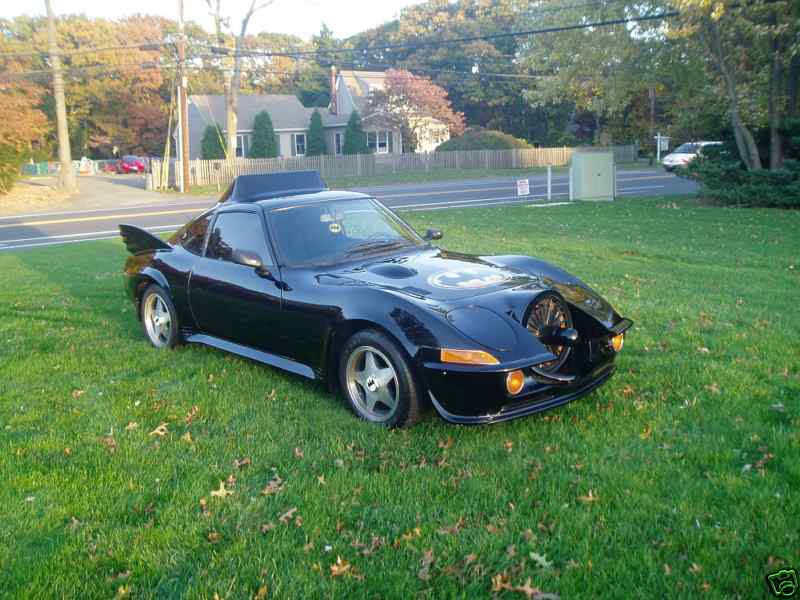 Illustration for article titled Nice Price Or Crack Pipe: Opel GT Batmobile For $9000?